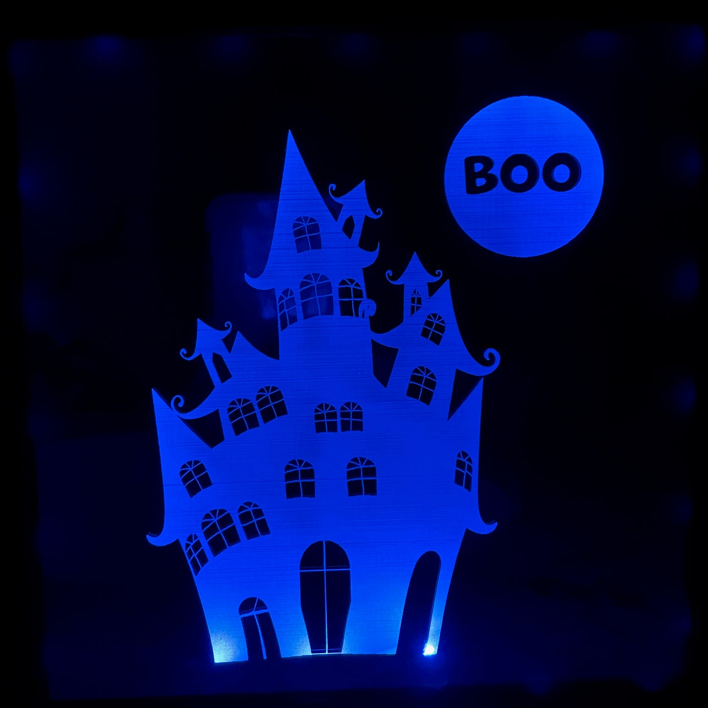 Haunted House engraved on mirror in shadow box frame illuminated blue