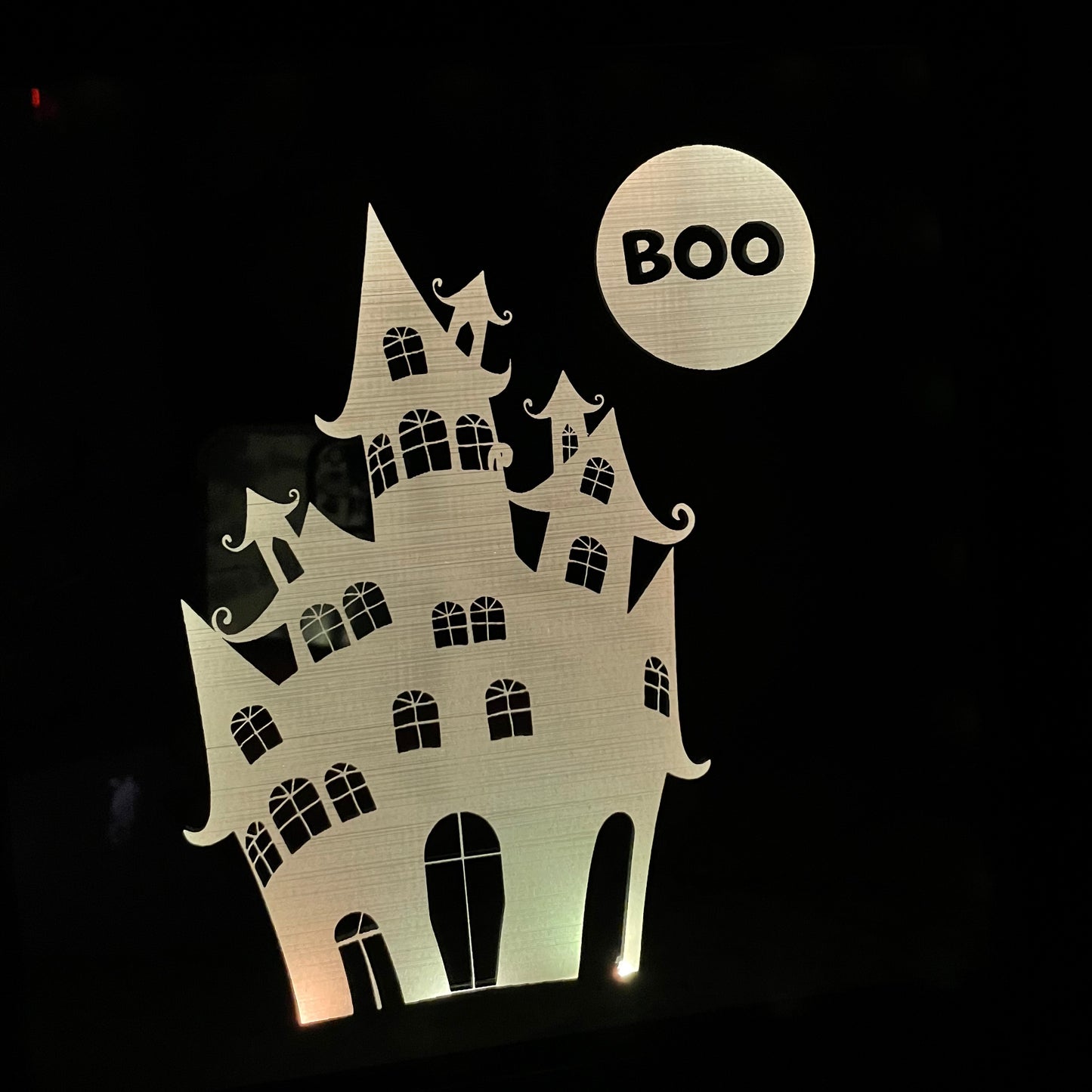 Haunted House engraved on mirror in shadow box frame illuminated white