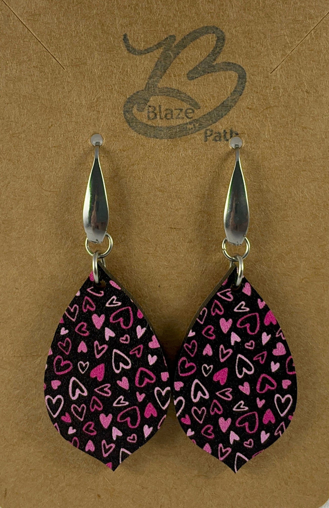 Pink on Black Micro-Print Hearts teardrop shaped acrylic earrings on stainless steel ear wires