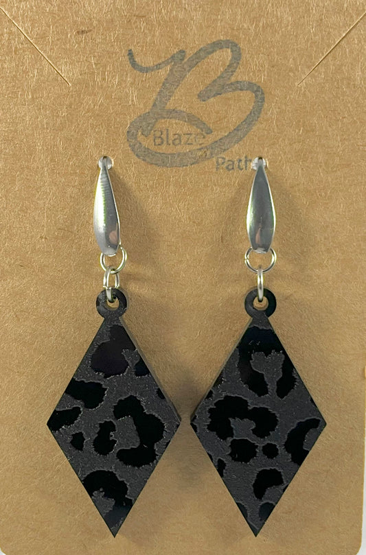 Diamond-shaped leopard print black on black ac relic earrings on stainless steel ear wires with teardrop accent