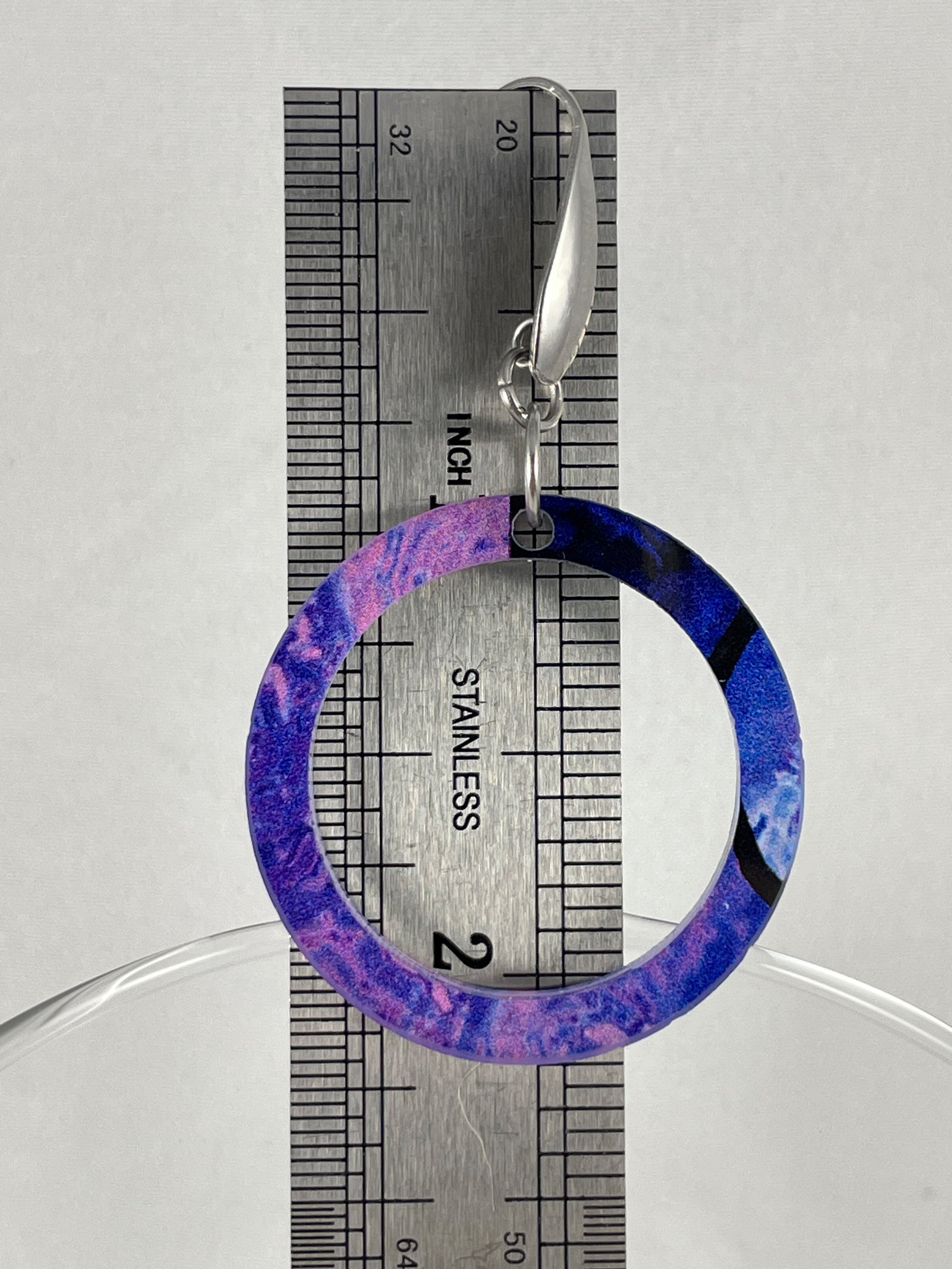 Size reference showing 2.25" drop length for abstract purple round dangle acrylic earrings