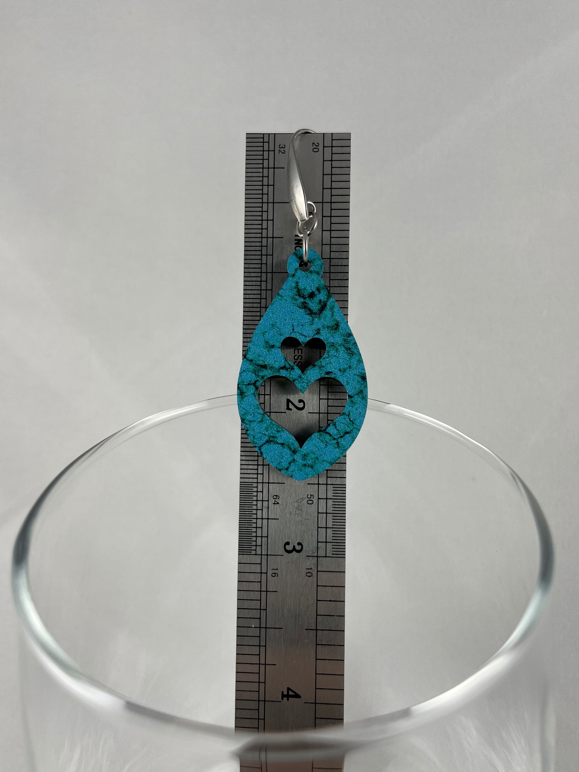 Size reference showing drop length of 2.5" for Turquoise acrylic teardrop heart earrings with stainless steel ear wires with teardrop accent