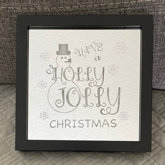 Holly Jolly Christmas engraved on mirror in black square shadow box frame